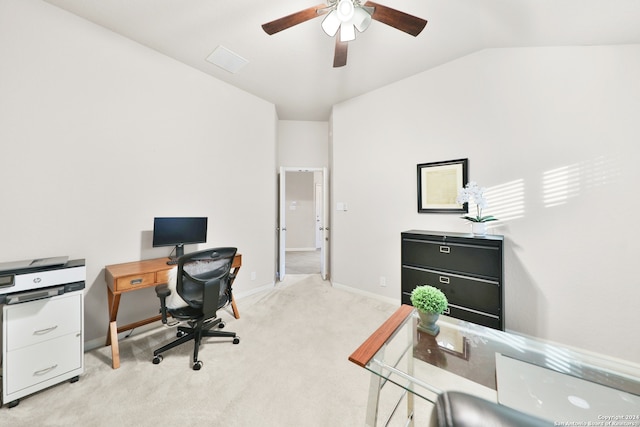 carpeted office space with ceiling fan and lofted ceiling