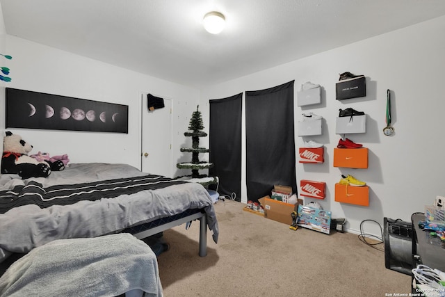 bedroom featuring carpet