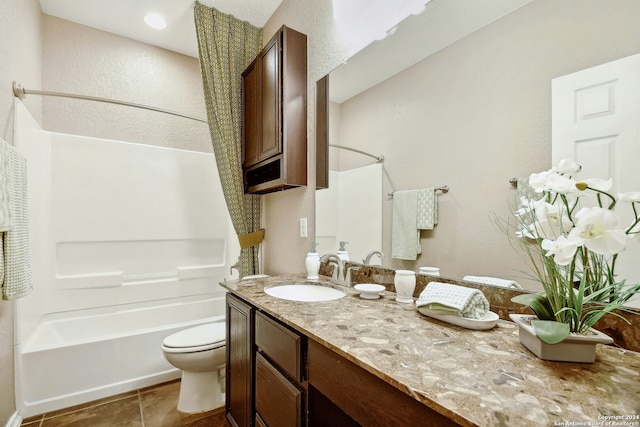 full bathroom with tile patterned flooring, vanity, shower / bathtub combination, and toilet