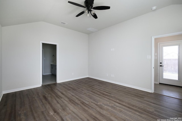 empty room featuring ceiling fan, dark wood-type flooring, and lofted ceiling