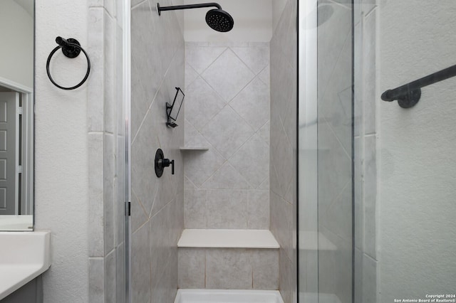 bathroom with an enclosed shower