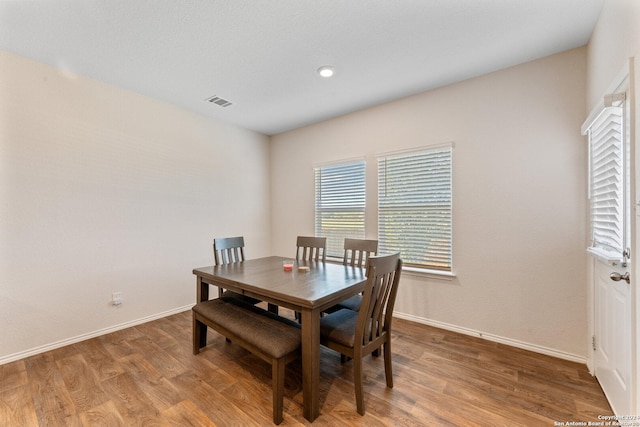 dining room featuring wood-type flooring