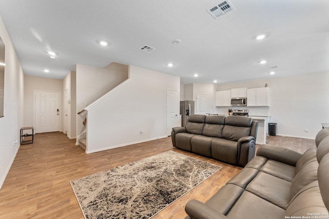 living room with light wood-type flooring