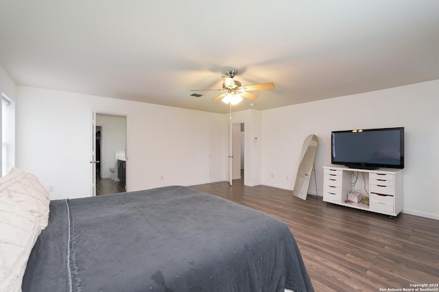 unfurnished bedroom with dark hardwood / wood-style floors and ceiling fan