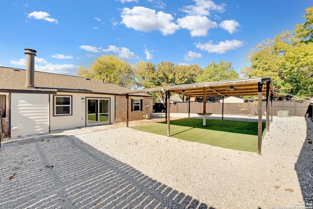 back of house with a patio