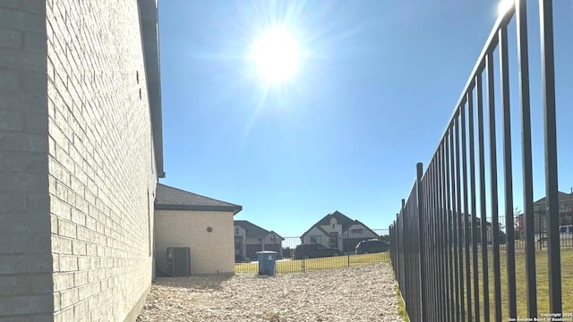 view of yard featuring central AC unit