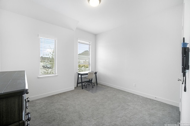 interior space featuring light colored carpet