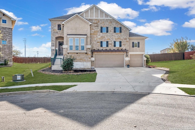 view of front of property with a garage and a front lawn