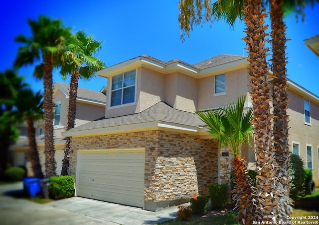 view of front of home with a garage