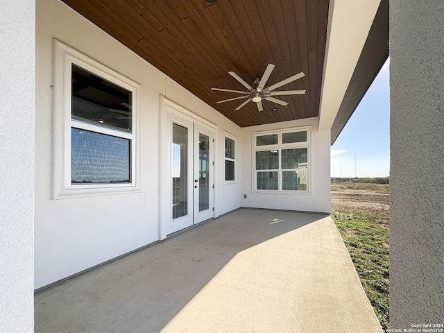 view of patio with ceiling fan and french doors