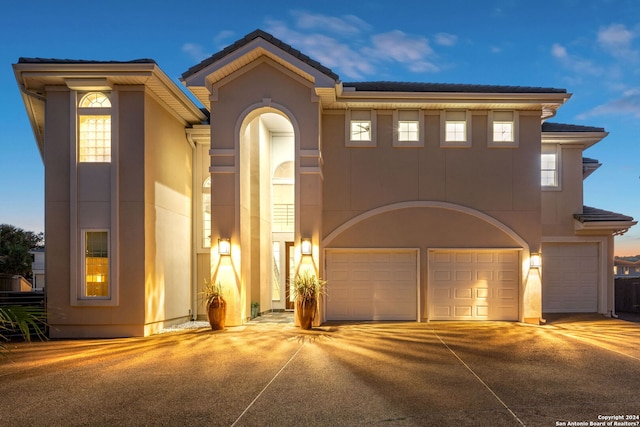 view of front of home with a garage