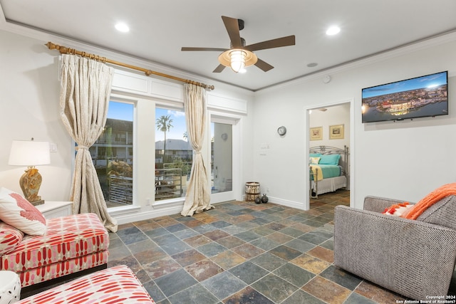 living room featuring ceiling fan and ornamental molding