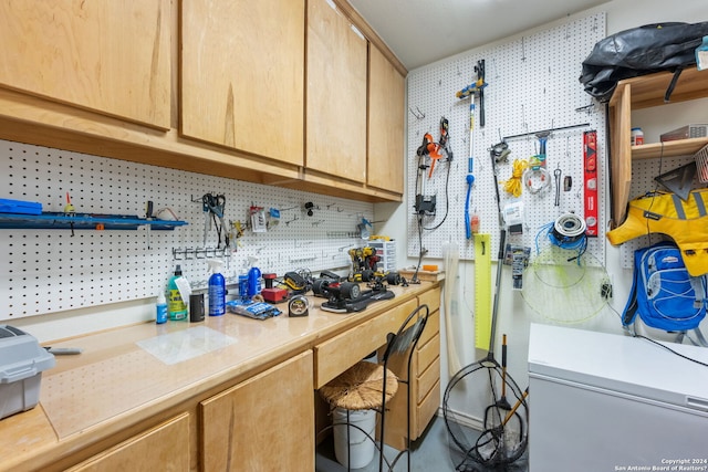 kitchen featuring light brown cabinetry