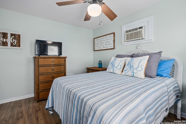 bedroom featuring an AC wall unit, ceiling fan, and dark hardwood / wood-style flooring