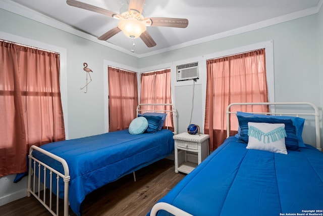 bedroom featuring wood-type flooring, multiple windows, ornamental molding, and ceiling fan