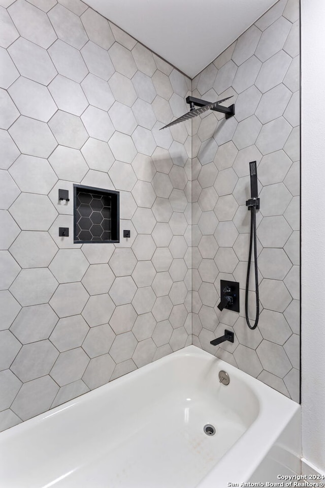 bathroom with shower / tub combination