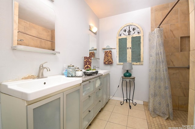 bathroom featuring tile patterned floors, a shower with curtain, and vanity