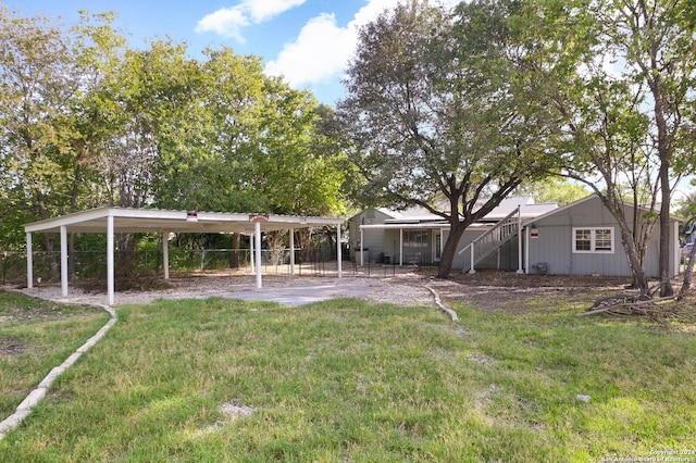 view of yard featuring a carport