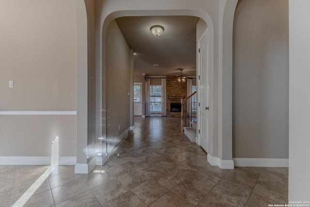 corridor featuring tile patterned flooring