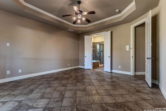 unfurnished bedroom with ceiling fan, crown molding, and a tray ceiling