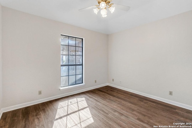 spare room with ceiling fan and hardwood / wood-style floors