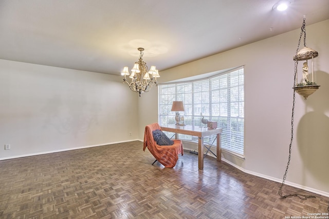 home office featuring a chandelier, dark parquet flooring, and plenty of natural light