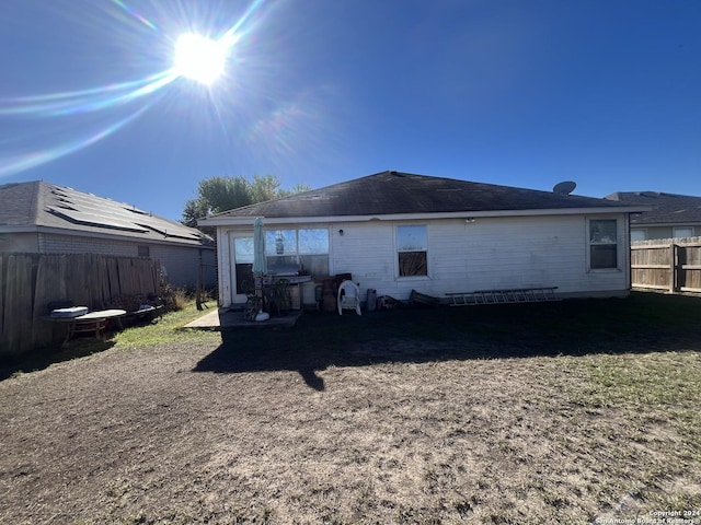 back of house featuring a patio