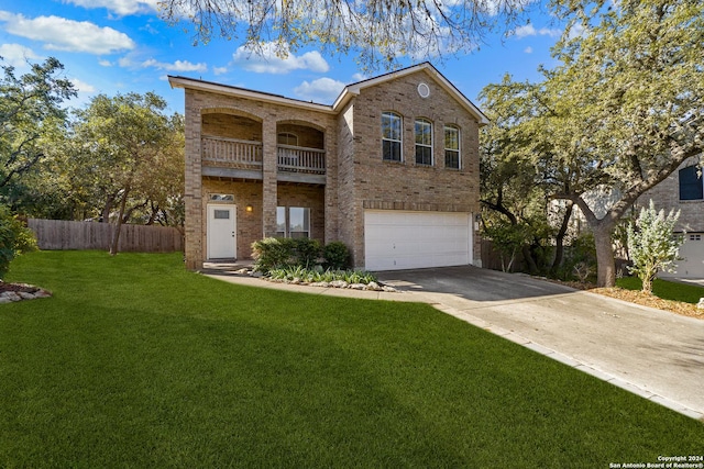 view of front facade featuring a balcony, a garage, and a front lawn