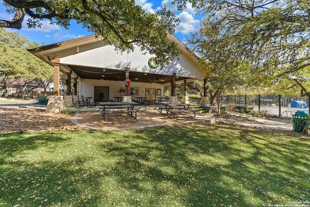 exterior space featuring a lawn and a patio