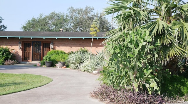 246 Mccain, Raymondville, TX 78580 - view of front facade with brick siding