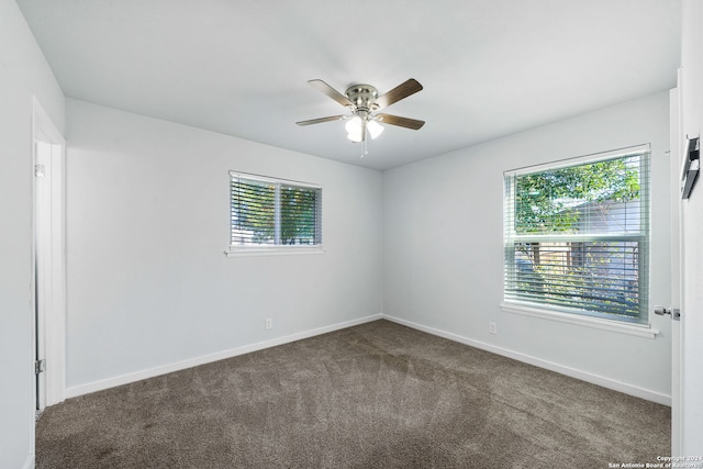 carpeted empty room with ceiling fan