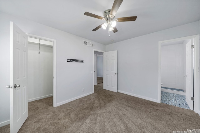 unfurnished bedroom featuring ceiling fan, a closet, and carpet floors