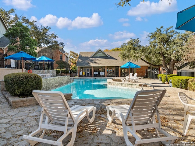 view of pool with a patio area