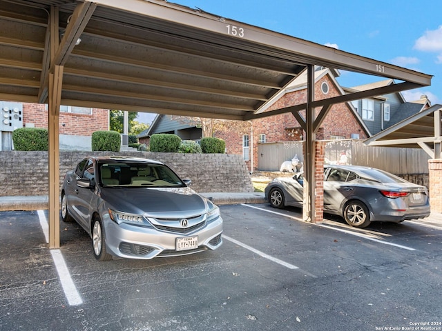 view of parking featuring a carport