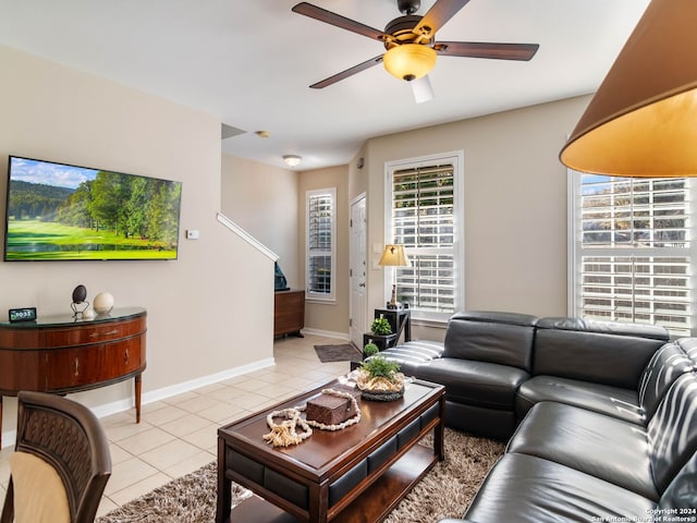 tiled living room featuring ceiling fan