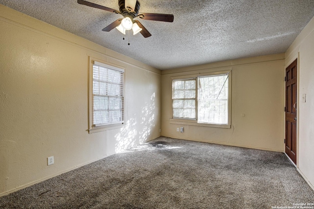 unfurnished room with carpet flooring, a textured ceiling, and ceiling fan