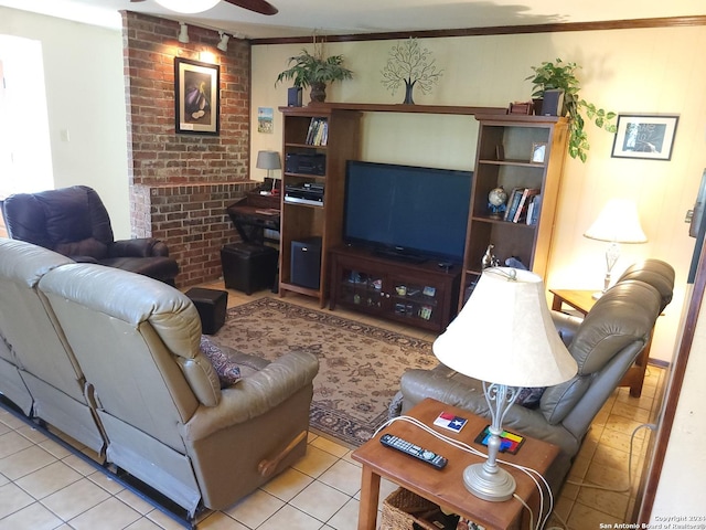 tiled living room featuring brick wall, ornamental molding, and a ceiling fan