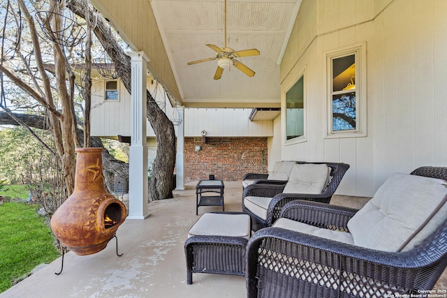 view of patio with ceiling fan and an outdoor living space