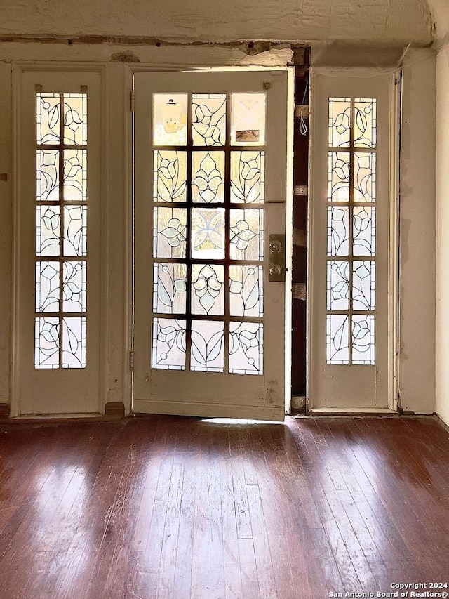 doorway featuring dark hardwood / wood-style flooring