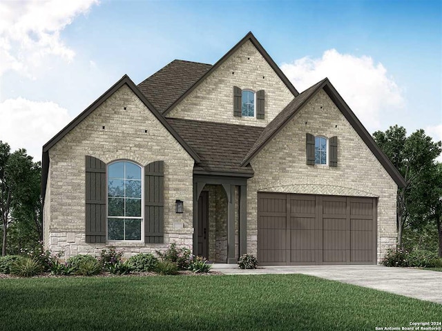 209 Teakmill Trl, San Marcos, TX 78666 - french provincial home featuring brick siding, a garage, concrete driveway, and a front yard