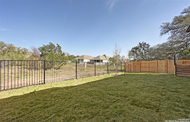 209 Teakmill Trl, San Marcos, TX 78666 - view of yard with a fenced backyard