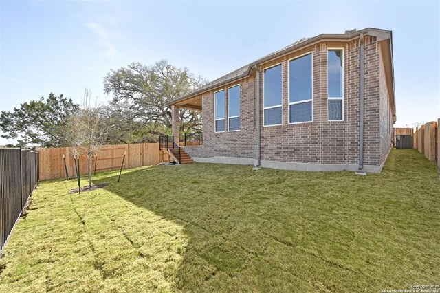 209 Teakmill Trl, San Marcos, TX 78666 - exterior space with a fenced backyard