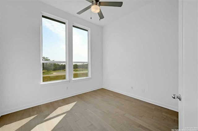 spare room with ceiling fan and light hardwood / wood-style floors