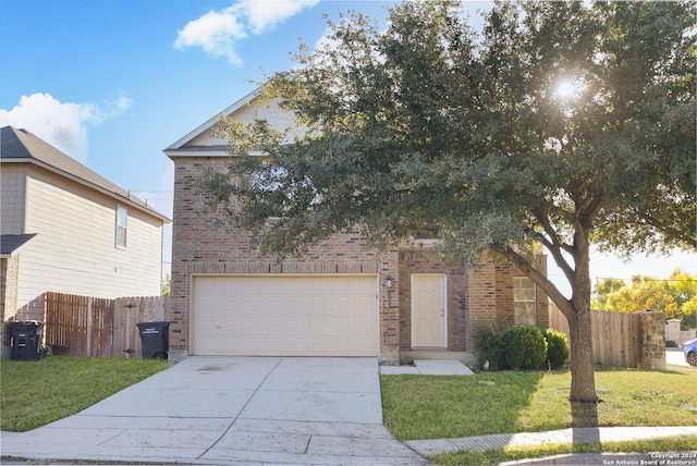 obstructed view of property with a garage and a front yard