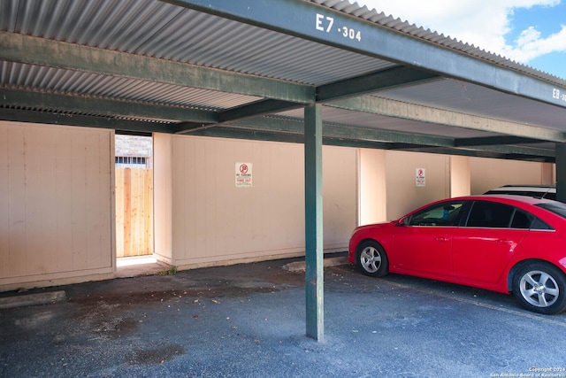 view of car parking featuring a carport