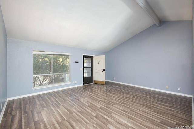 unfurnished living room with vaulted ceiling with beams and wood-type flooring