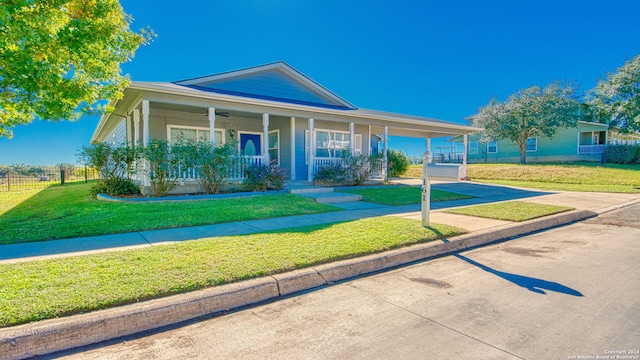 view of front of property with a front lawn and a porch