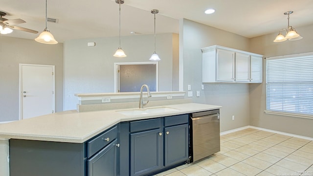 kitchen featuring ceiling fan, dishwasher, sink, light tile patterned flooring, and white cabinets