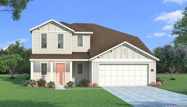 view of front of house featuring a garage and a front lawn