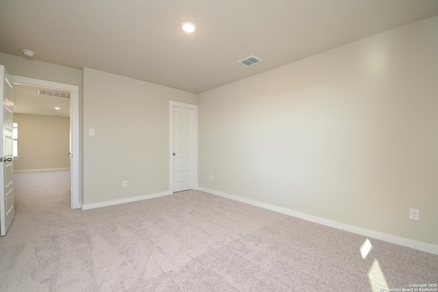 unfurnished bedroom with light carpet